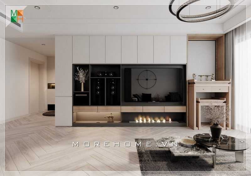 Sự sắp xếp thông minh và sử dụng hệ thống tủ kệ âm tường treo tivi đã tạo ra một vẻ đẹp thoáng đãng và tinh tế trong thiết kế nội thất phòng khách của chung cư hiện đại.
